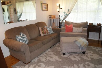 The living room is generously proportioned and fea