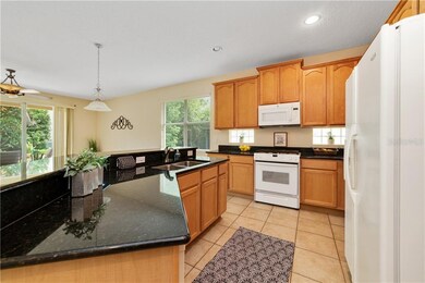 Spacious,bright open kitchen with eat in island.