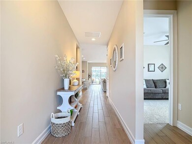 Corridor featuring hardwood / wood-style floors