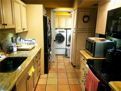 This updated kitchen has a gorgeous copper sink an