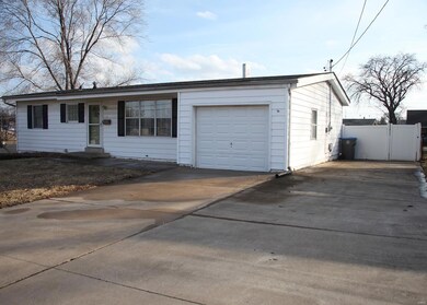 114 Cordes has an attached garage and a large driv