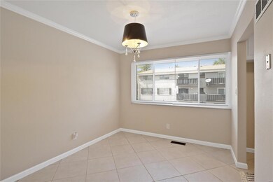 Dining area opens to living area