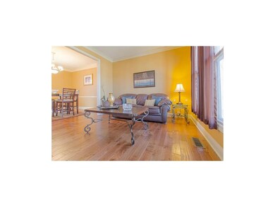 View of Living Room & partial Dining Room from Ent