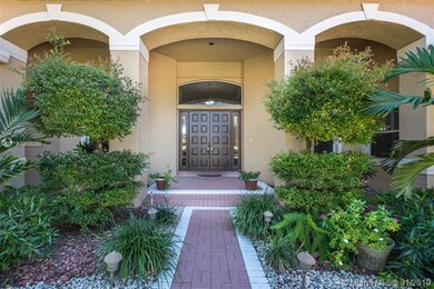 Raised entry with arched covered area.  Great to a