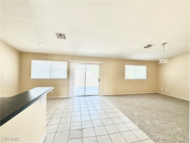 Front entry into kitchen and living room