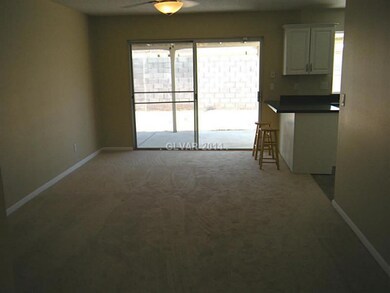Property Photo. Family room with ceiling fan