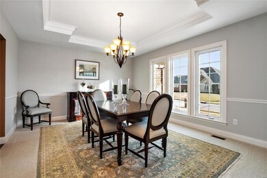 Formal dinning with beautiful tray ceiling & fresh