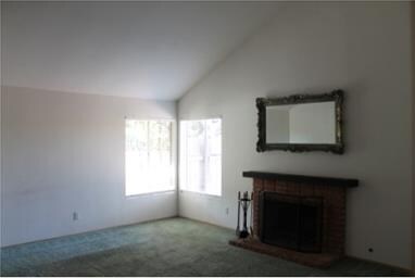 Large Living room with Cozy Fire Place and Vaulted