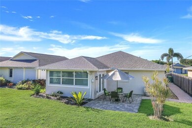 Single story home featuring a back yard and patio 