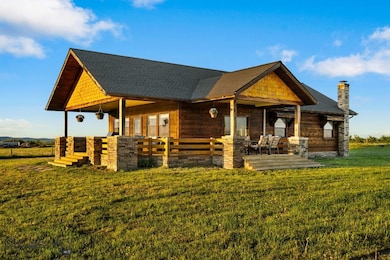 Wrap around porch with direct mountain views