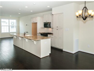 Kitchen - Photo is of a similar home in the commun