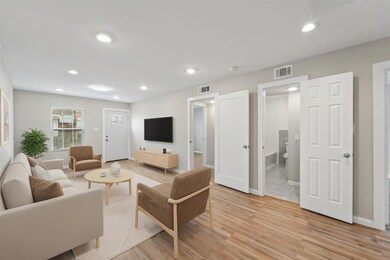 Spacious living room upon entry. [virtually staged