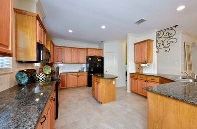 Huge kitchen open to breakfast and dining