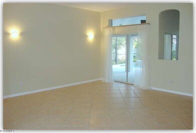 LIVING AREA VIEW TO POOL