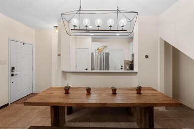 Dining room featuring tile patterned floors and b