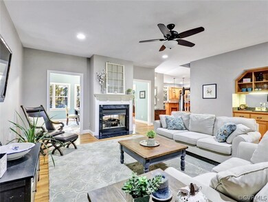 Family Room with Hardwood Floors, 2 sided Gas Fire