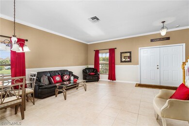 Foyer & Family Room - 2304 CAPE HEATHER CIR. Cape