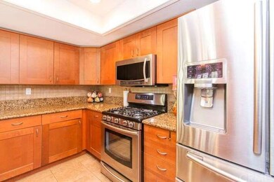 Remodeled Kitchen with Granite and Stainless Steel