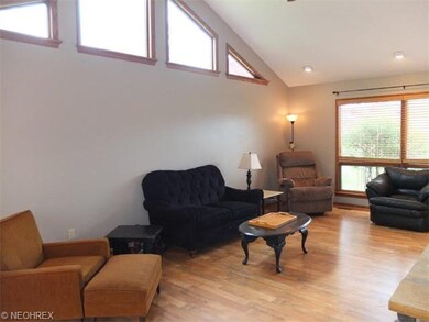 Great room with vaulted ceiling.