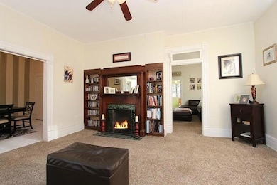 Family Room w/ Decorative Fireplace