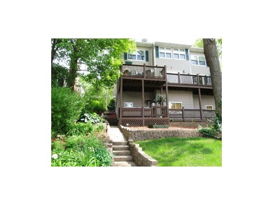 REAR ELEVATION. Two tiered decks. Home has vinyl s