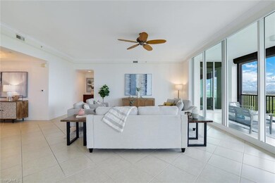 Living room featuring ornamental molding, ceiling 