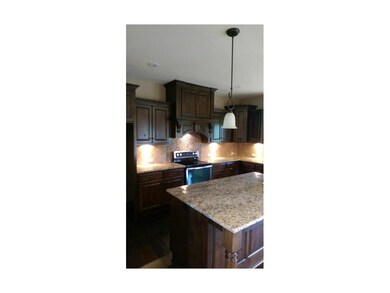Spacious kitchen with island. Large walk-in pantry
