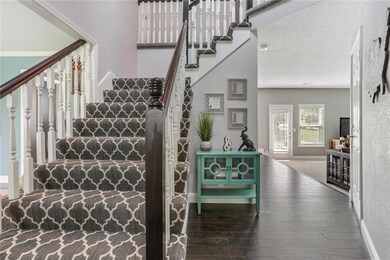 Adorable entry w/ new wood floors