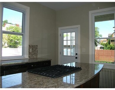 Kitchen. A view of the back door / porch and the e
