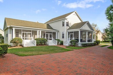 Side view of home with 2 spacious screened patios 