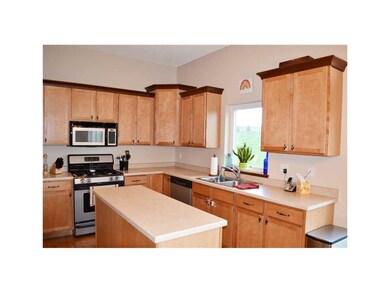 Kitchen. Kitchen with hardwood floors, upgraded ca