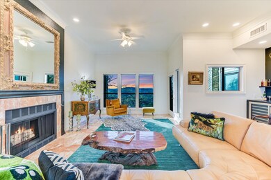 Living room with a tiled fireplace, visible vents