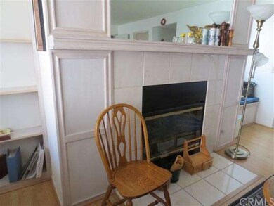 Attractive fireplace in living room/dining area fl