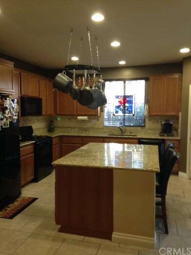 Big kitchen with granite counters and custom trave