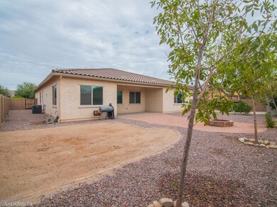Large landscaped back yard with RV gate