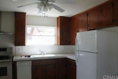 Here's the sunny kitchen with those original knott
