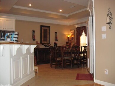 Breakfast Bar entry to Trey Ceiling in Dining Area