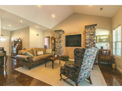 Living Room. Floors have a heating system that provides radiant heat throughout the home.