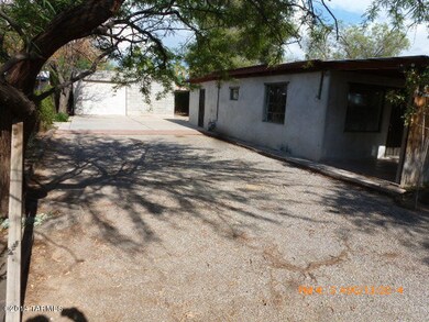 SIDE VIEW OF HOUSE & GARAGE