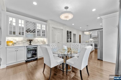 Flowing Seamlessly into Inviting Living and Dining Areas