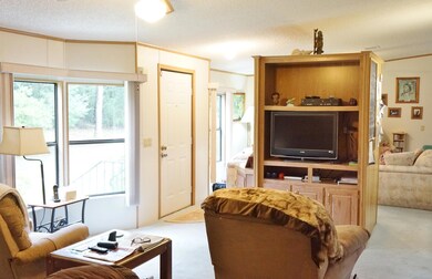 Den has entertainment center