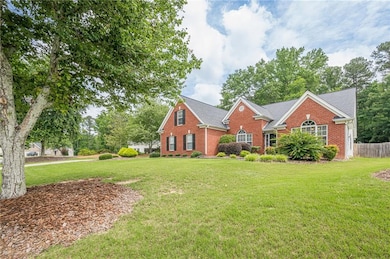 View of front of house with brick siding