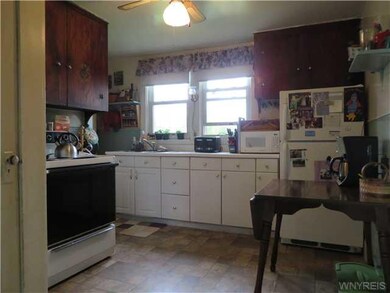 Kitchen. Efficient kitchen features new vinyl floo