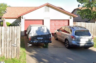 View of front of property featuring concrete driv