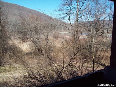 Exterior Front. Hi-Tor and pond-view from porch