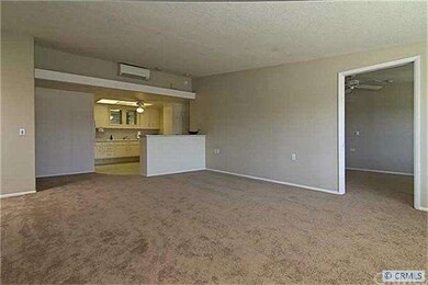 Living room looking toward kitchen
