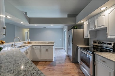 Kitchen with brand new stainless steel appliances 