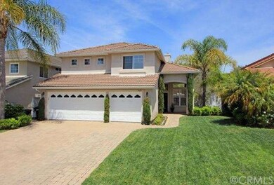 Three car garage and long driveway