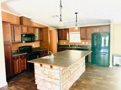 1119 W B Lewing Rd, Many, LA 71449 - photo 6