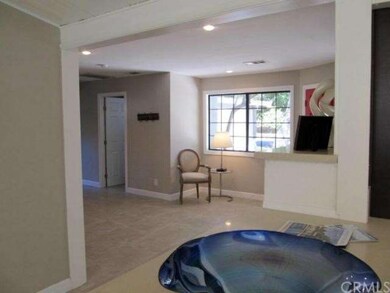View from kitchen/dining area looking at the foyer